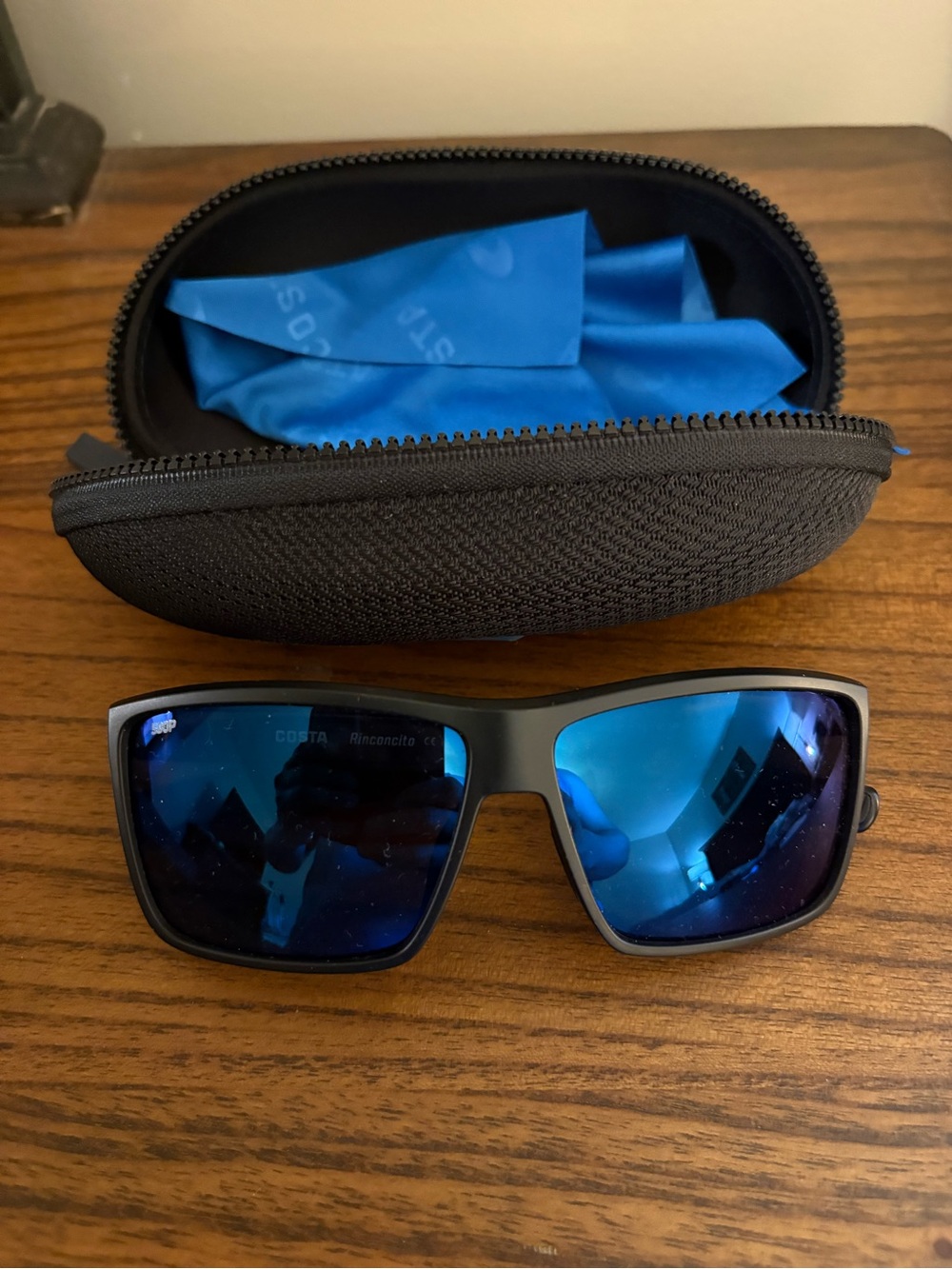 Costa Rinconcito Black Frame Sunglasses with Blue Mirror Lenses